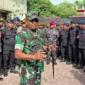 Danrem Lilawangsa Kolonel Inf Ali Imran saat memimpin apel gabungan pengamanan aksi mahasiswa di depan gedung DPRK Lhokseumawe, Senin (1/9/2025). 